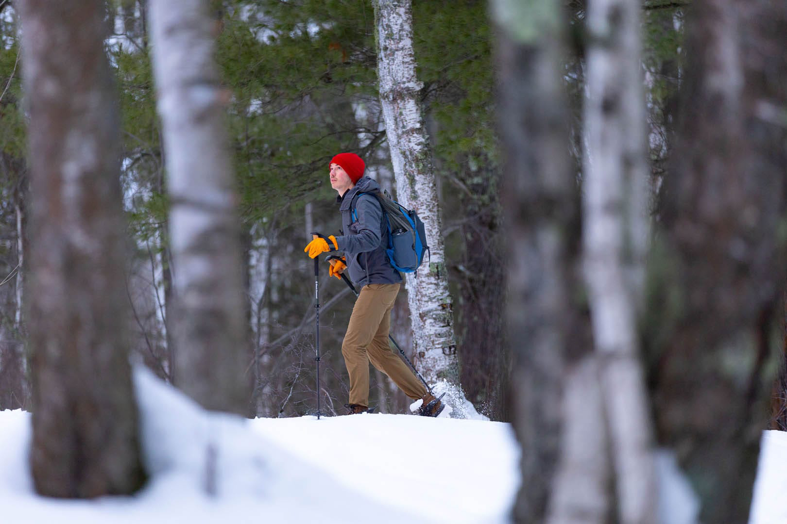 Person walking hiking on a Superior trail in the winter.