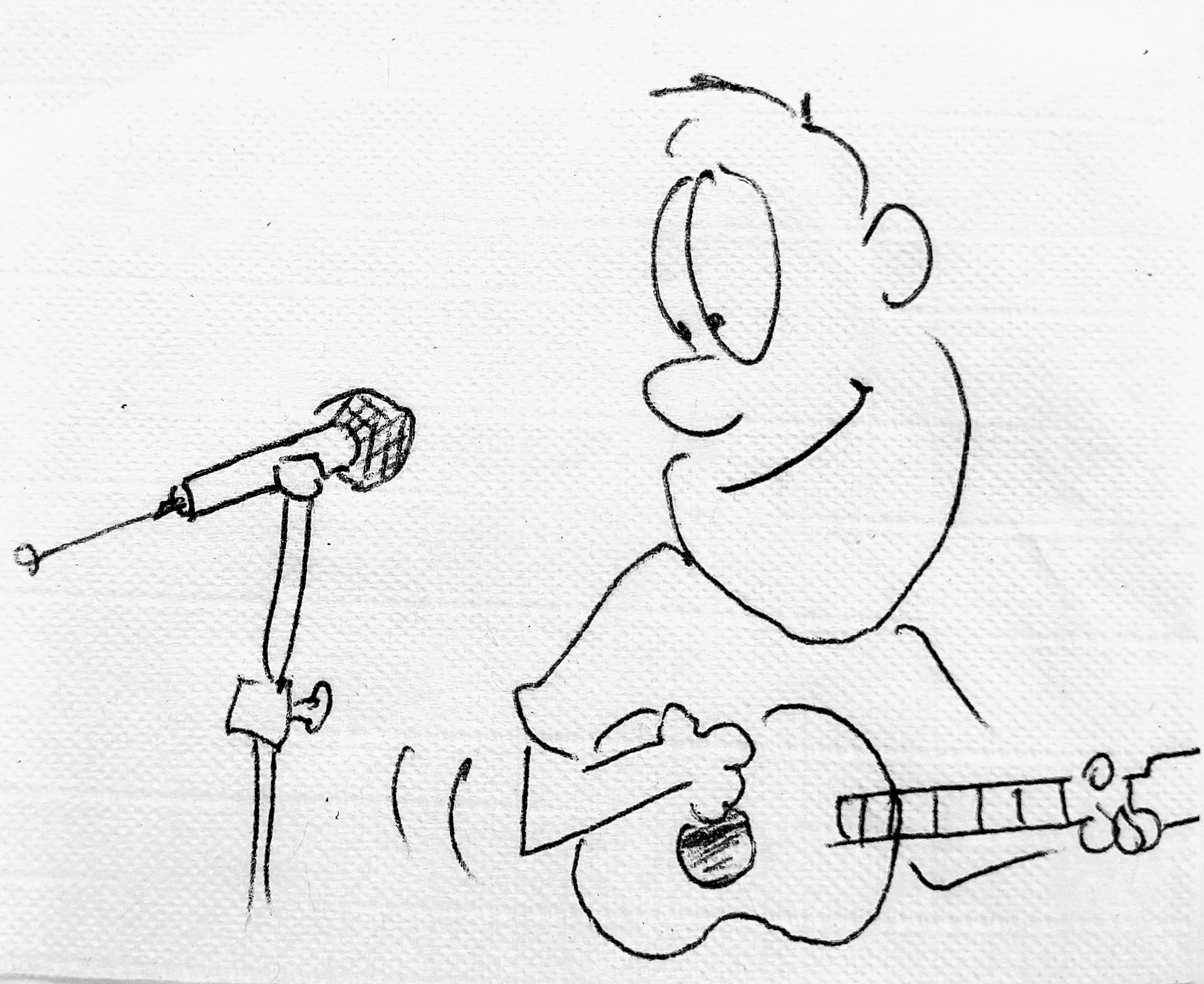 A napkin drawing of someone playing the guitar and singing.