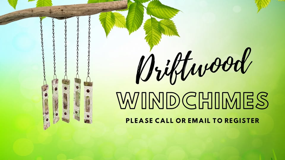 A set of driftwood windchimes hangs from a tree branch on the left; the background is green with light bokeh effects. Text reads: "Driftwood Windchimes. Please call or email to register.