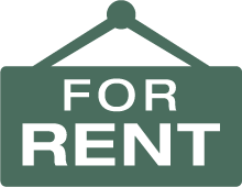 A sign with the words "FOR RENT" in bold, white capital letters on a green background, hanging from a post.