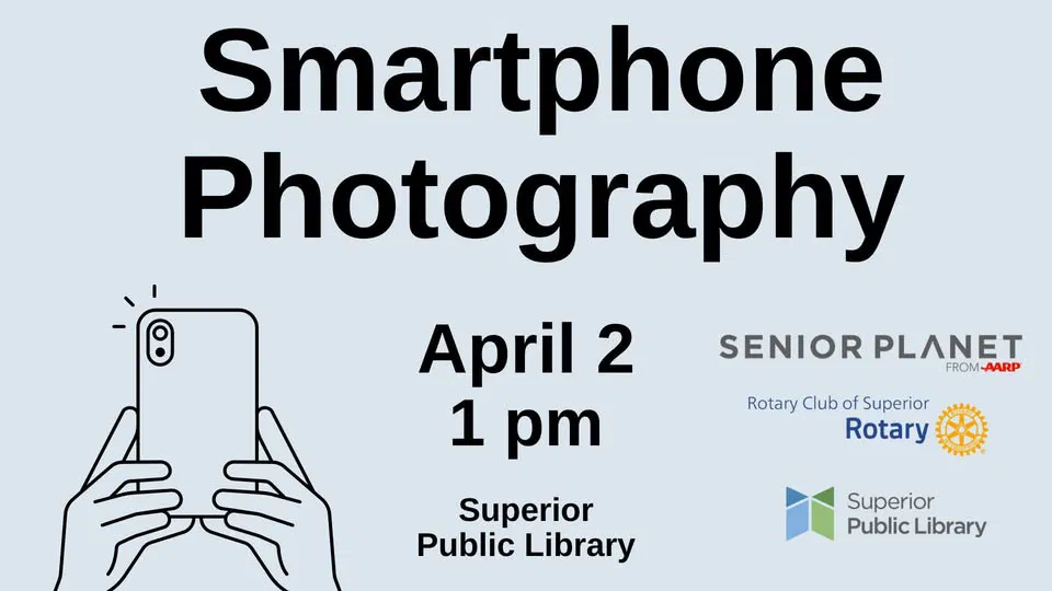 Flyer with "Smartphone Photography" in large text. Below, it says "April 2, 1 pm, Superior Public Library." Features a hand holding a smartphone and logos for Senior Planet, Rotary, and Superior Public Library.