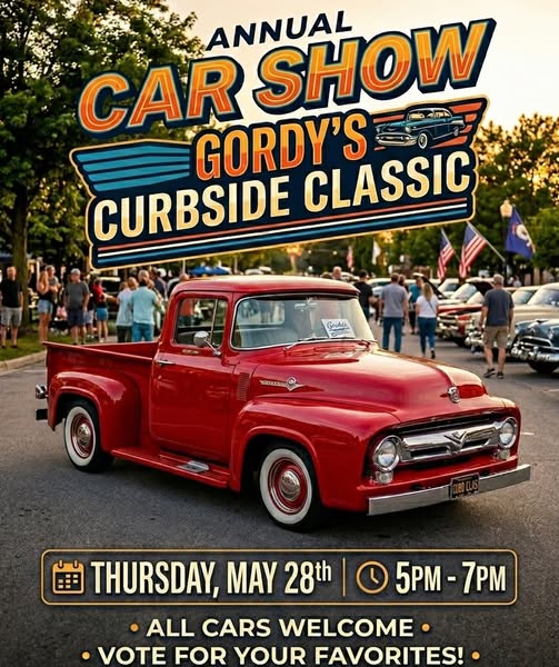 A bright red vintage pickup truck is parked at a car show with people and American flags in the background. Text reads: “Annual Car Show—Gordy’s Curbside Classic. Thursday, May 28th, 5–7 PM. All cars welcome. Vote for your favorites!”.