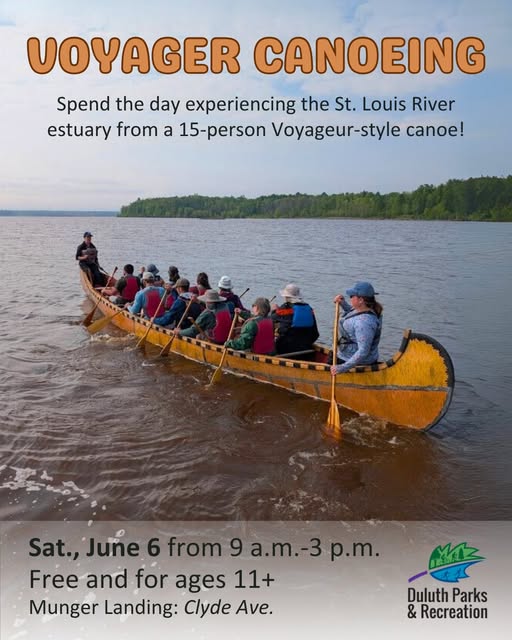 A group of people paddle a large 15-person canoe on a calm river, surrounded by trees. Text promotes a Voyager canoeing event on June 6, free for ages 11+, at Munger Landing, hosted by Duluth Parks & Recreation.