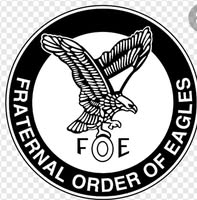 A black and white circular logo featuring an eagle with outstretched wings and the letters "FOE" below it, surrounded by the words "FRATERNAL ORDER OF EAGLES.