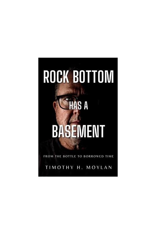 Book cover for "Rock Bottom Has a Basement" by Timothy H. Moylan, featuring a man's partially shadowed face with bold white text overlaying the image.