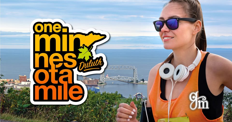 Woman in sunglasses and headphones jogs with Duluth cityscape, lake, and bridge in background; “one minnesota mile Duluth” logo appears on left.