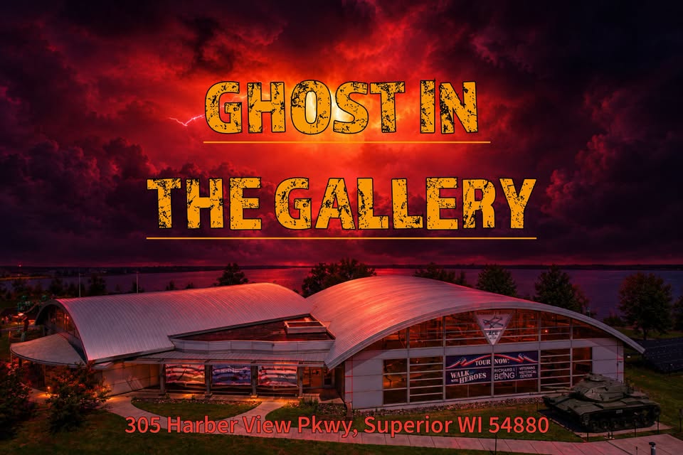 A glowing red sky with “Ghost in the Gallery” text above a modern building at night. Address “305 Harbor View Pkwy, Superior WI 54880” is written at the bottom.